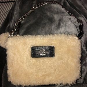 Coach shearling clutch